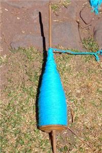 Spindle with Turquoise Yarn Journal: 150 Page Lined Notebook/Diary