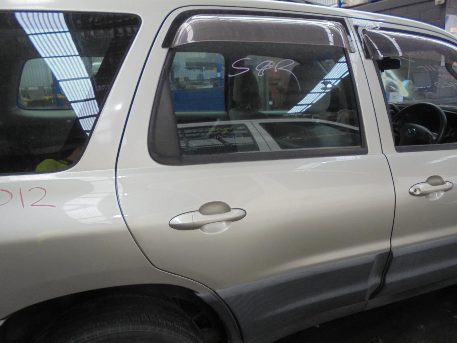 View Auto part Door/Boot/Gate Lock Mazda Tribute 2004