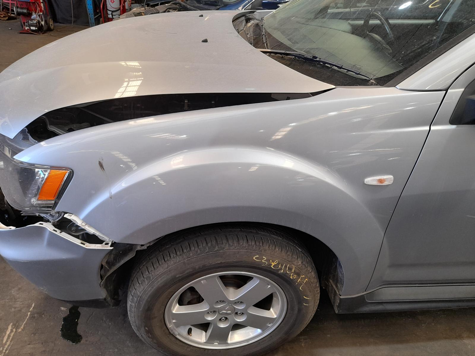View Auto part Left Guard Mitsubishi Outlander 2011