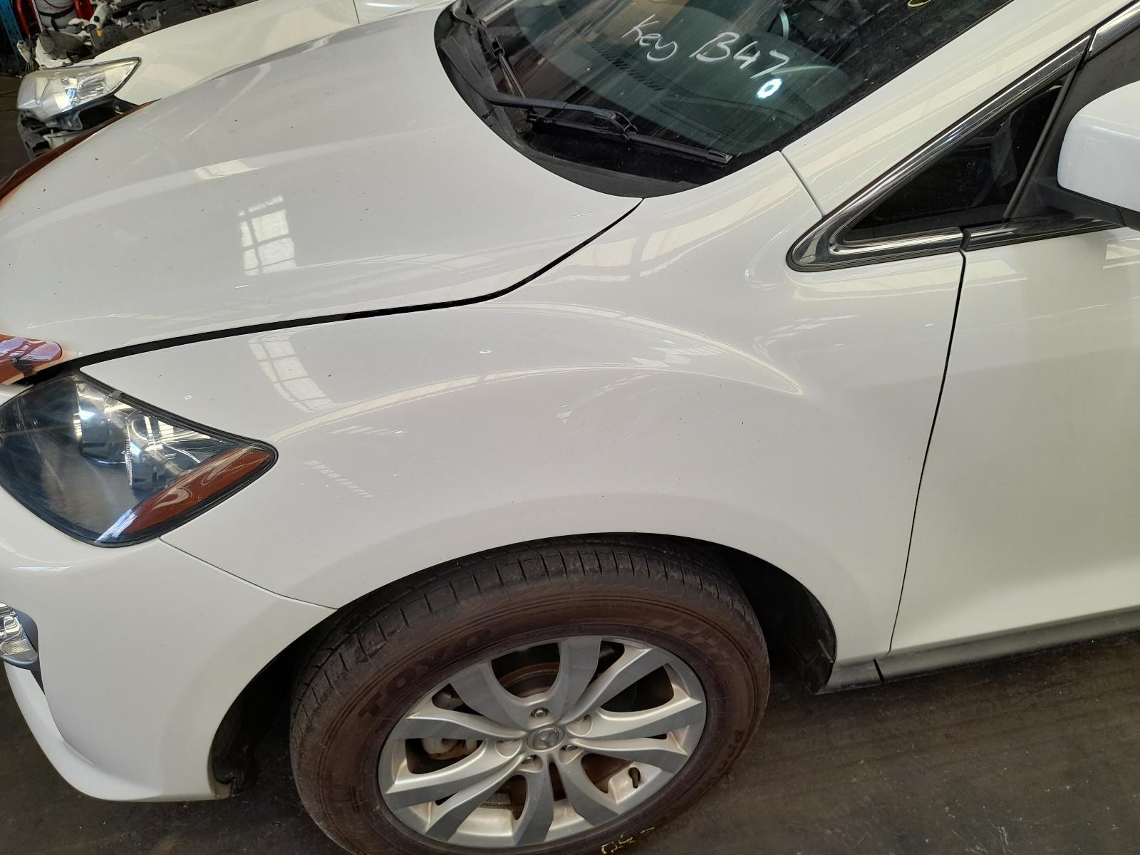 View Auto part Left Guard Mazda Cx7 2011