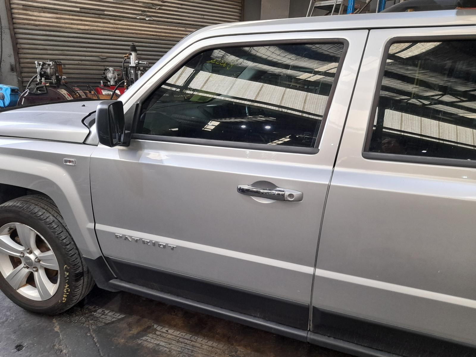 View Auto part Left Front Door Jeep Patriot 2011