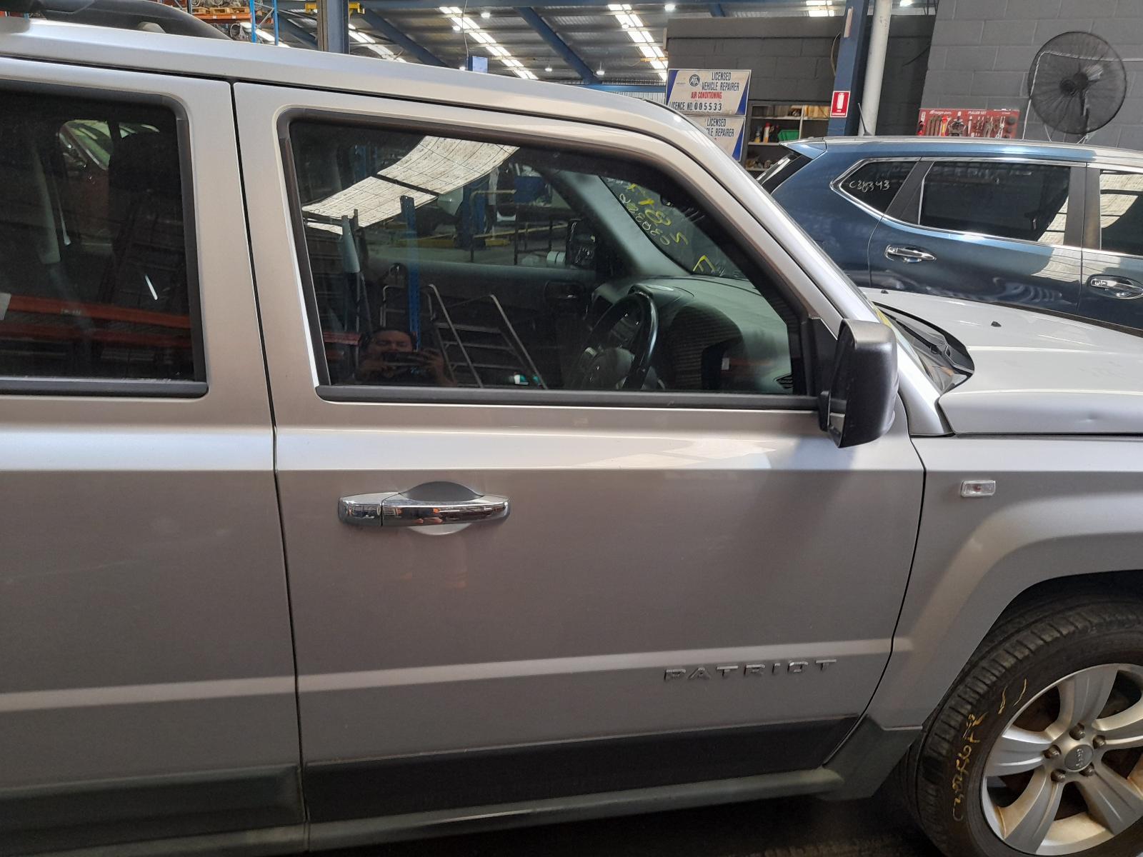 View Auto part Right Front Door Jeep Patriot 2011