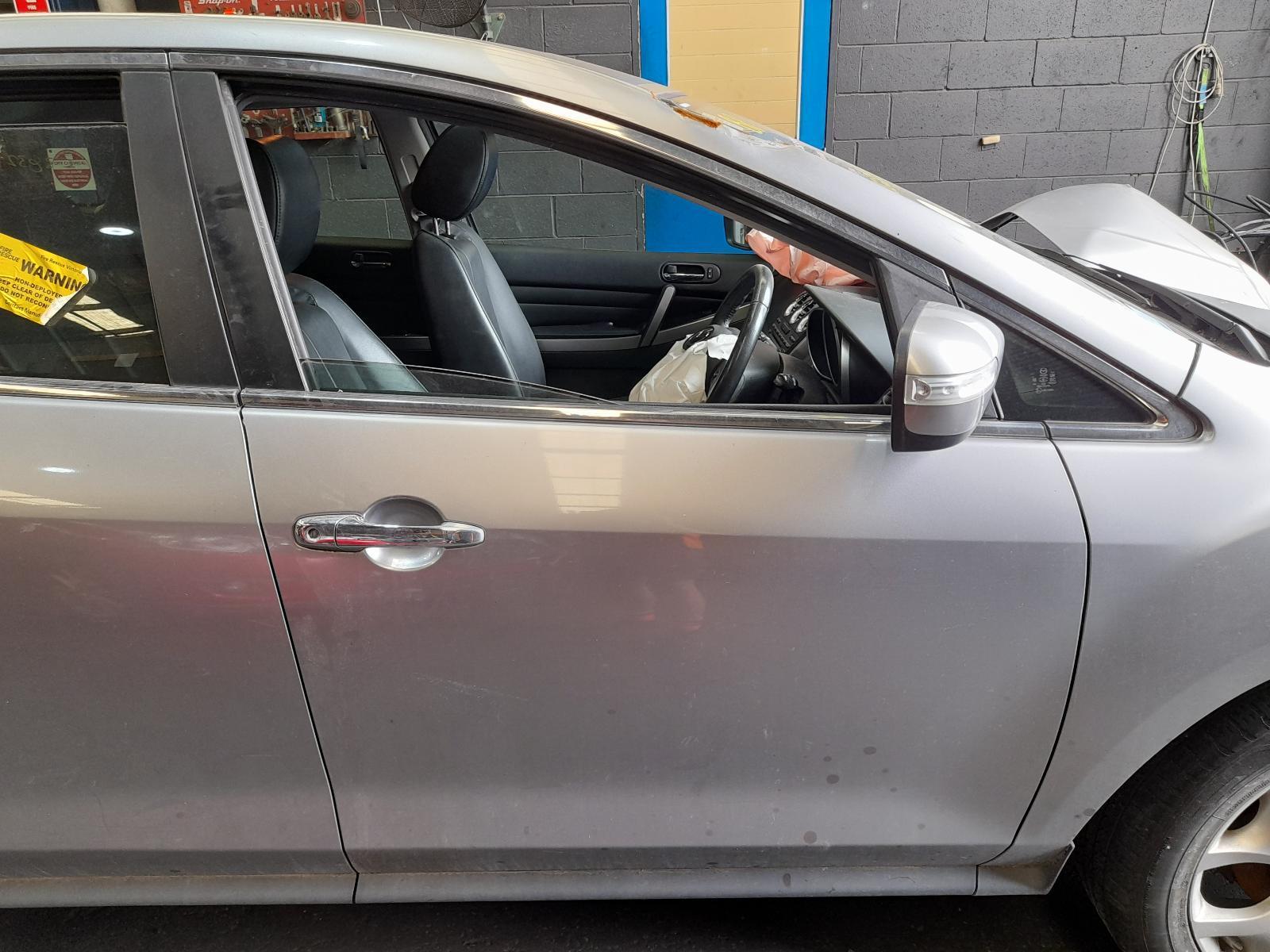 View Auto part Right Front Door Mazda Cx7 2011
