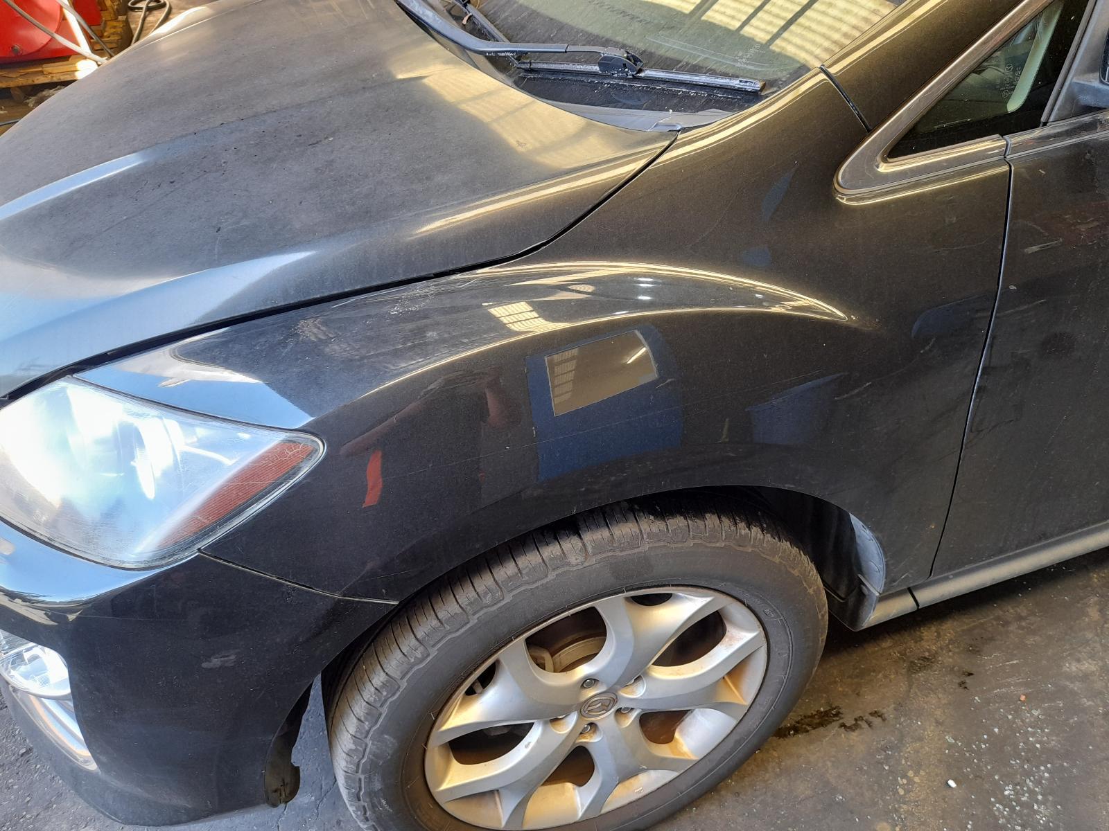 View Auto part Left Guard Mazda Cx7 2011