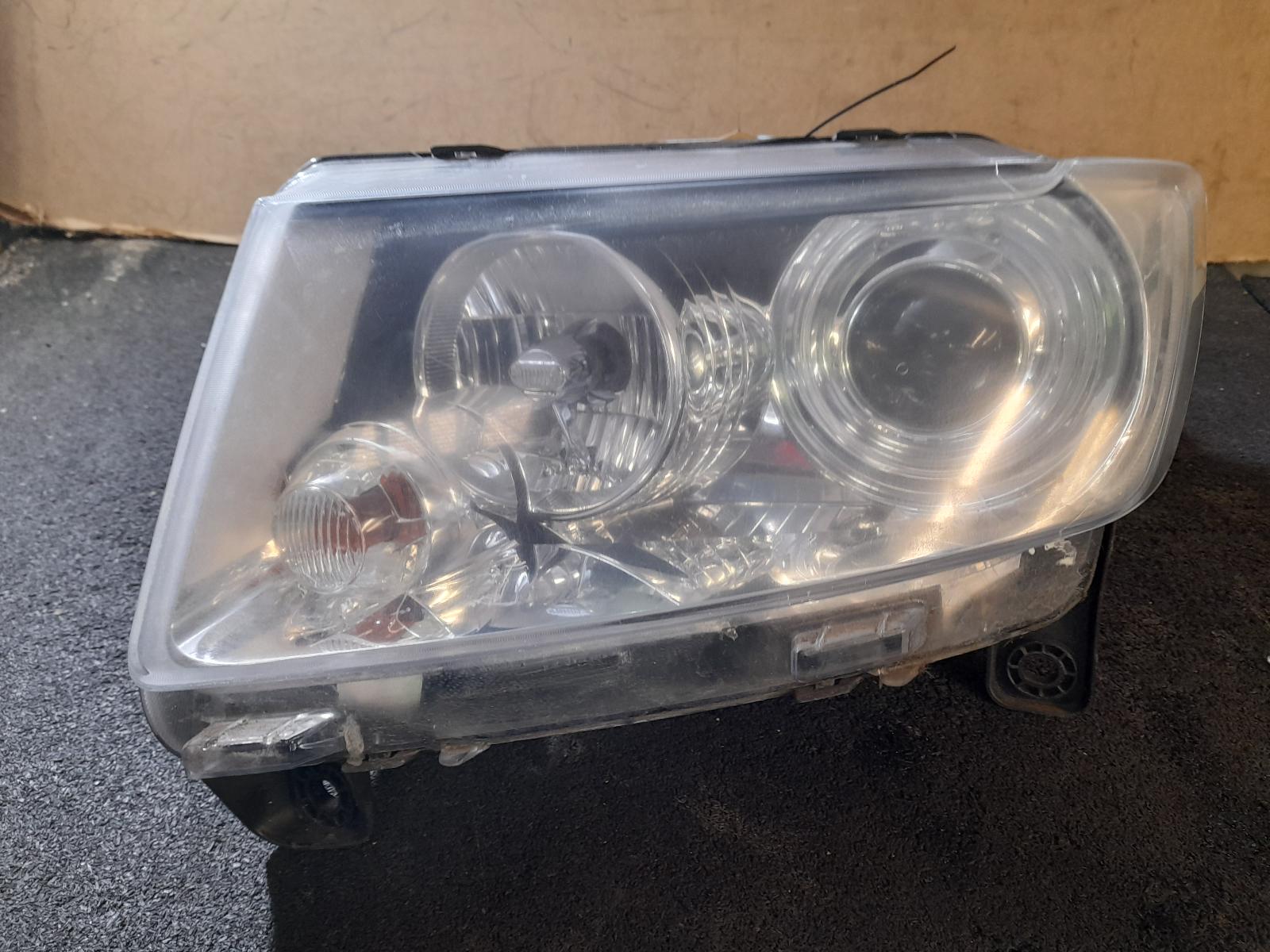View Auto part Left Headlamp Jeep Grandcherokee 2011