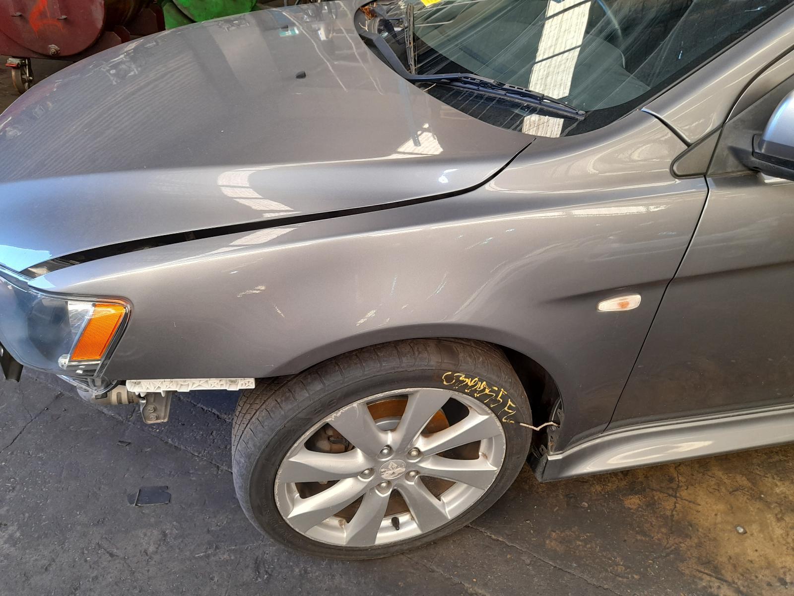 View Auto part Left Guard Mitsubishi Lancer 2013