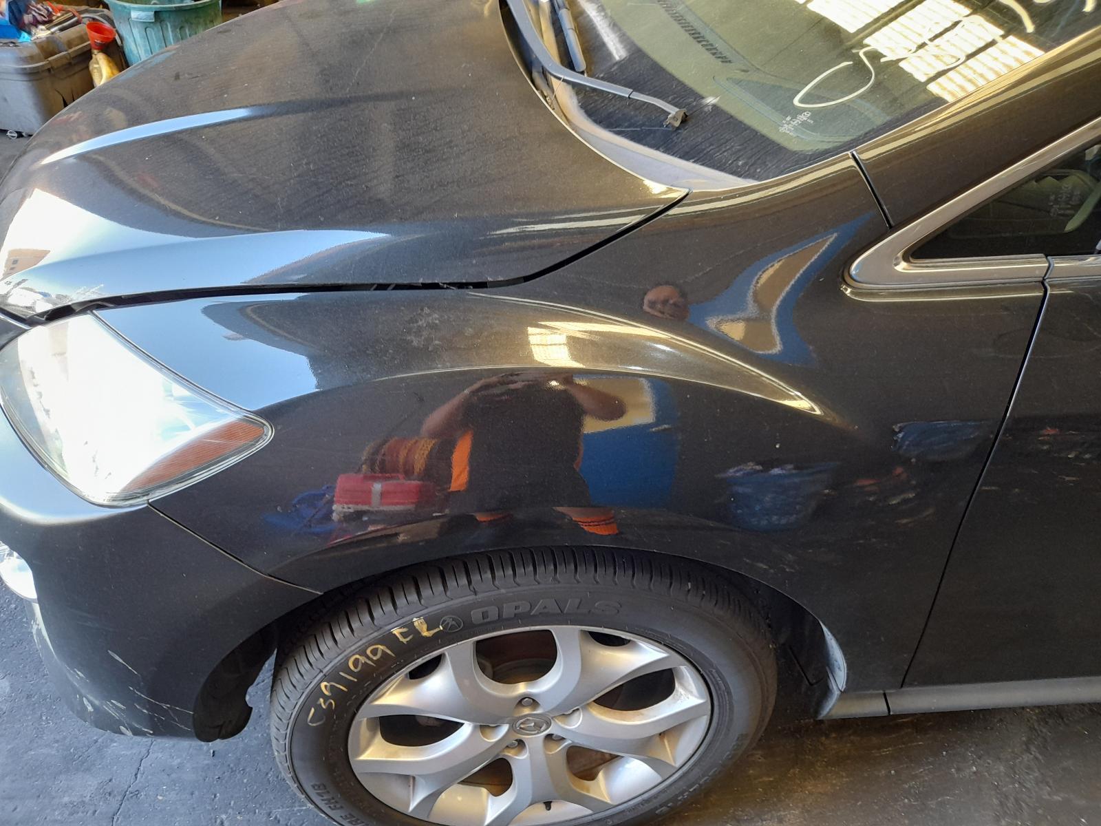 View Auto part Left Guard Mazda Cx7 2011