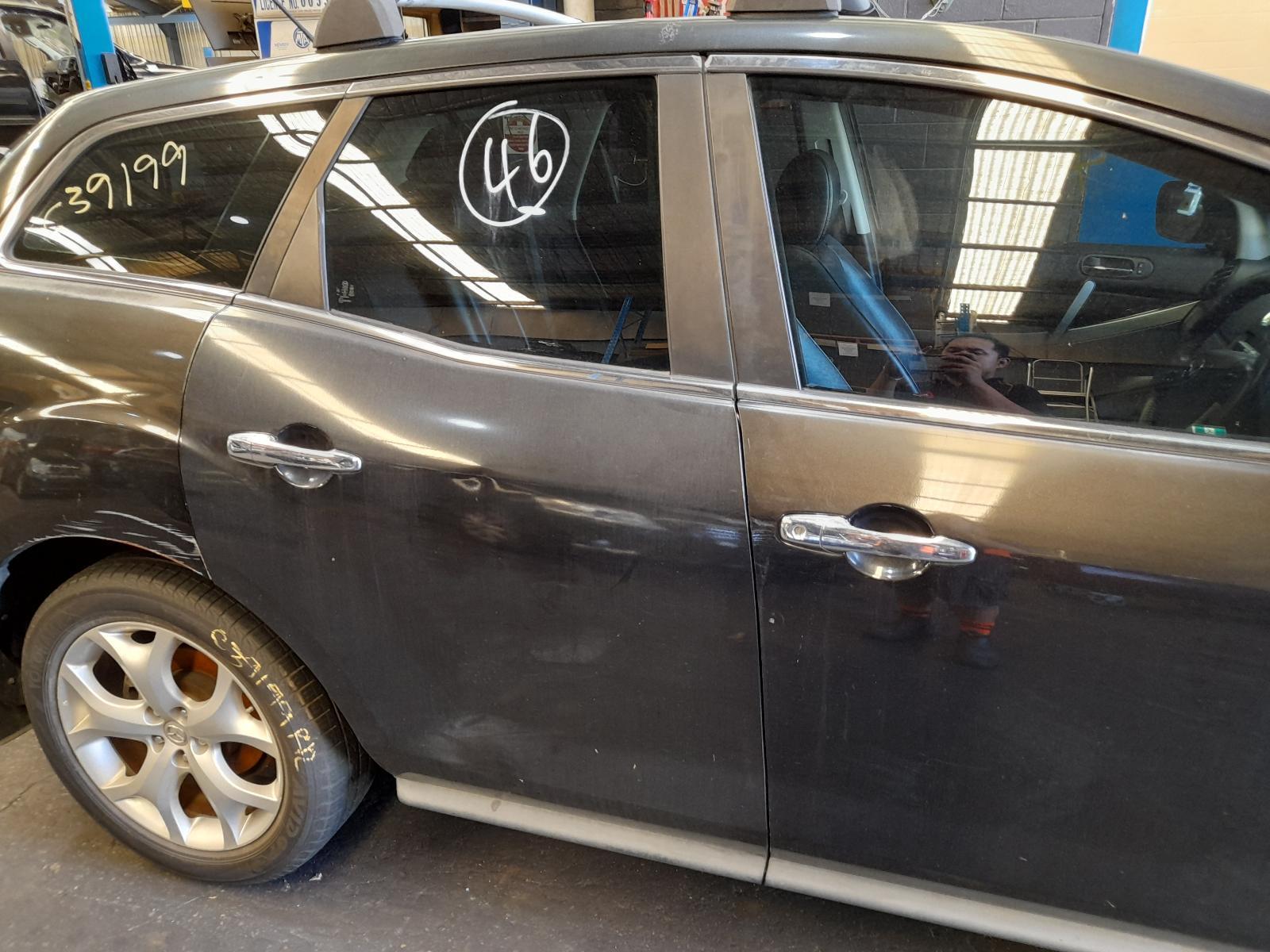 View Auto part Right Rear Wnd Reg/Motor Mazda Cx7 2011