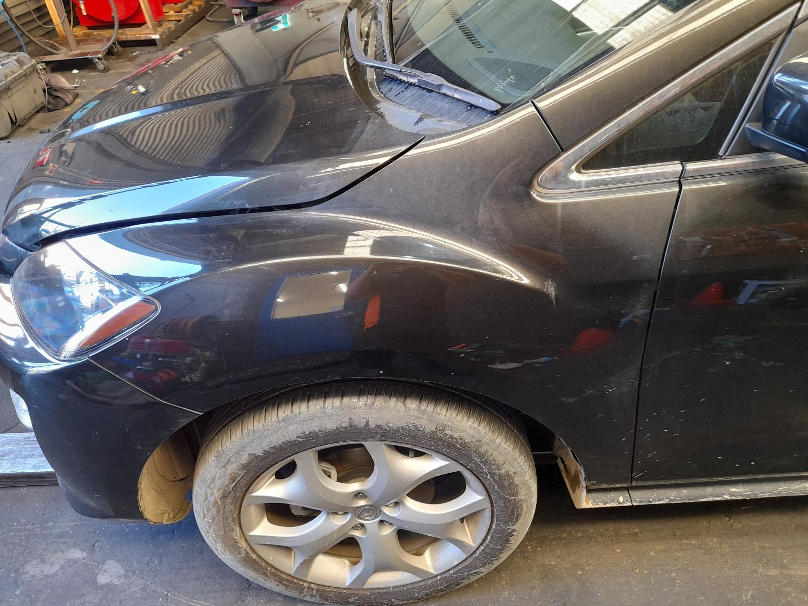 View Auto part Left Guard Mazda Cx7 2011