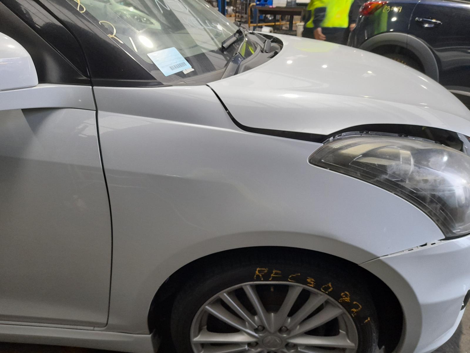 View Auto part Left Front Strut Suzuki Swift 2012