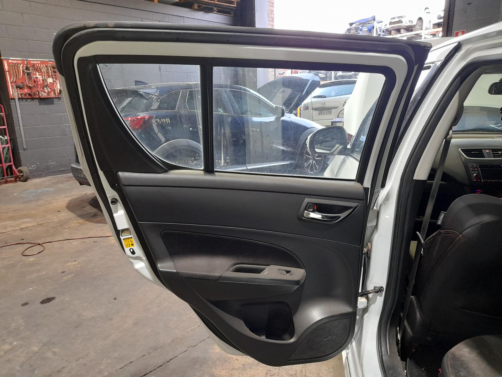 View Auto part Left Front Strut Suzuki Swift 2012