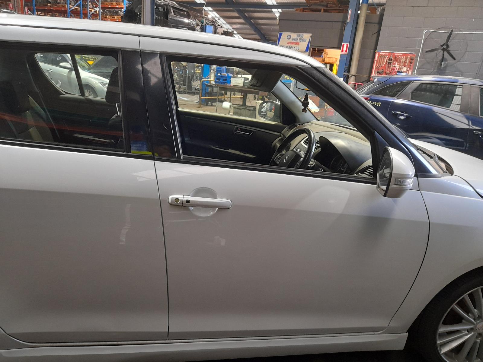 View Auto part Left Front Strut Suzuki Swift 2012