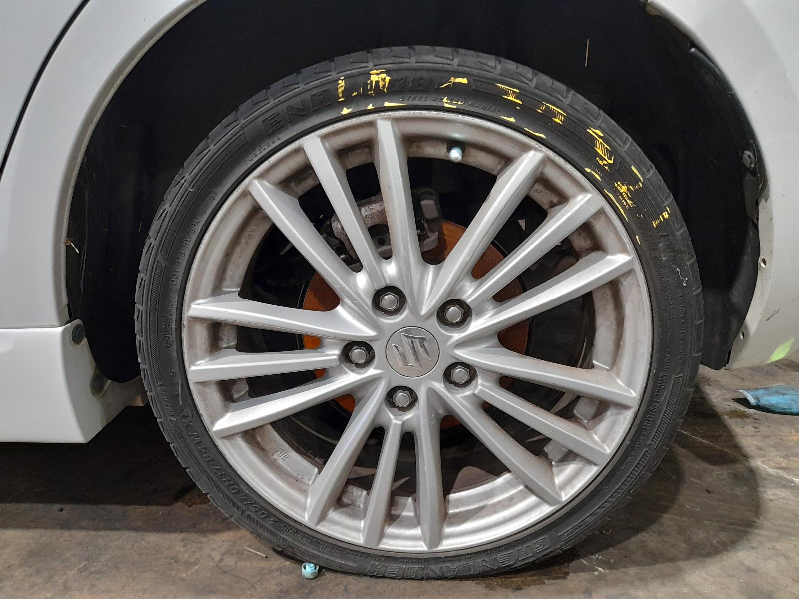 View Auto part Left Front Strut Suzuki Swift 2012