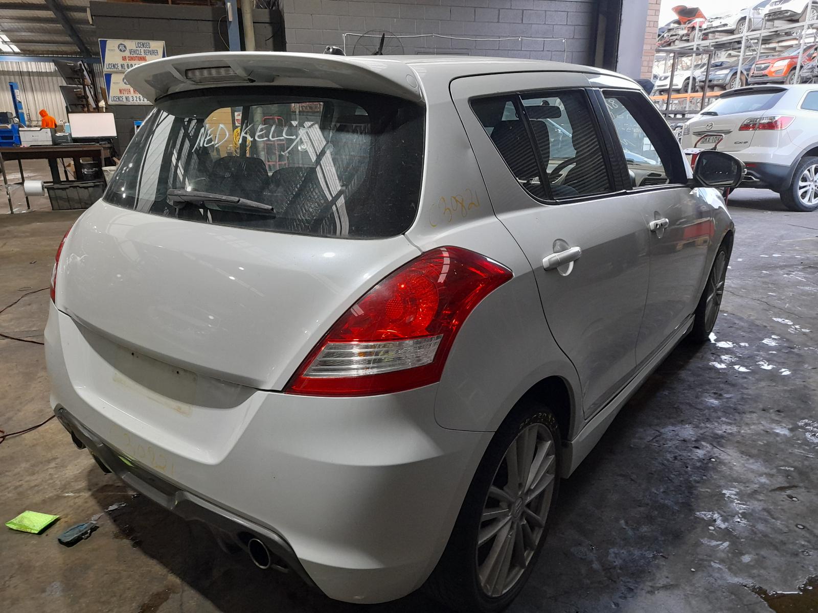 View Auto part Left Front Strut Suzuki Swift 2012