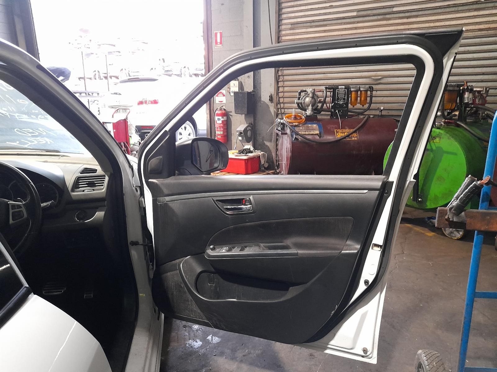 View Auto part Left Front Strut Suzuki Swift 2012