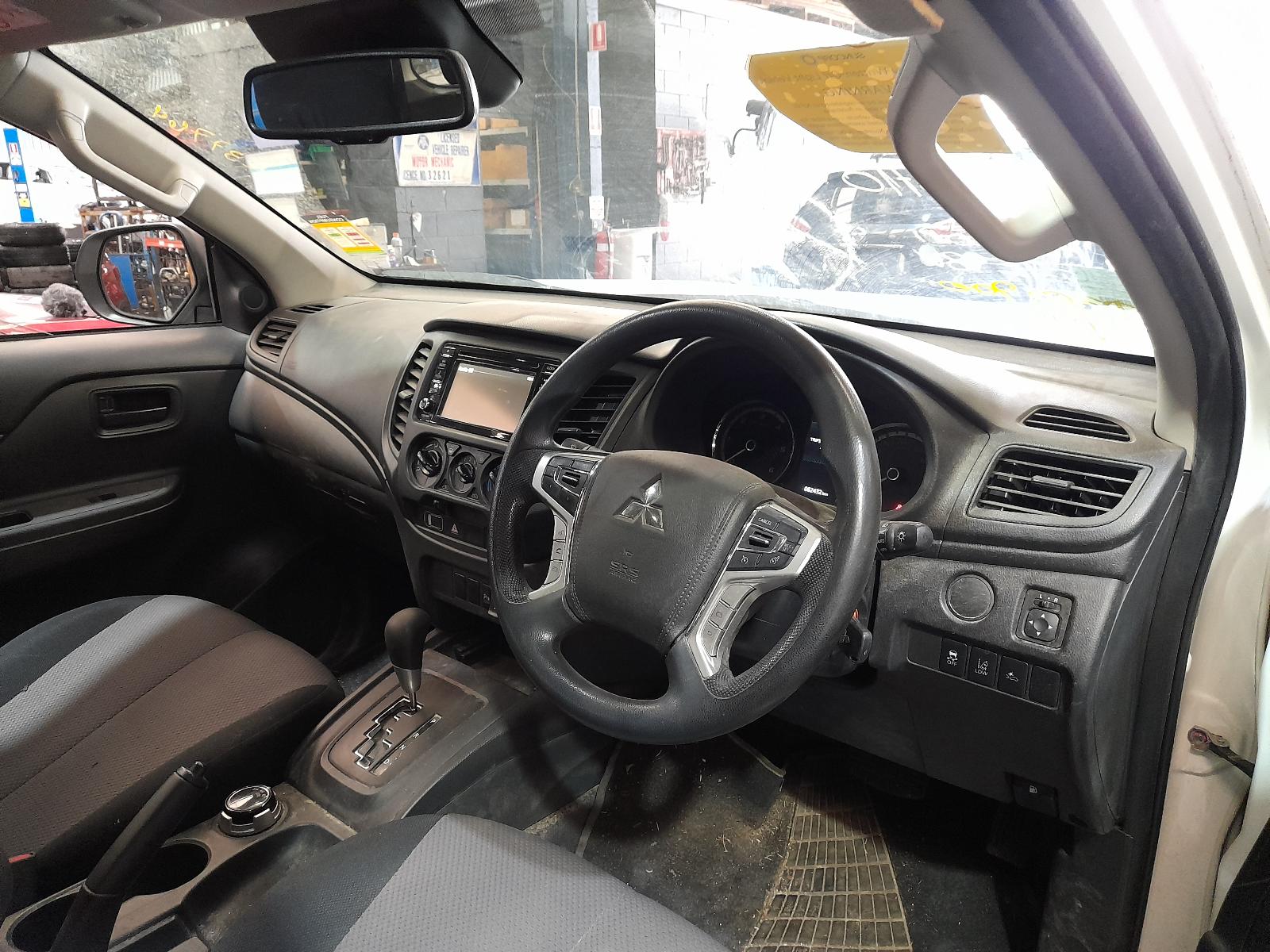 View Auto part Console Mitsubishi Triton 2020