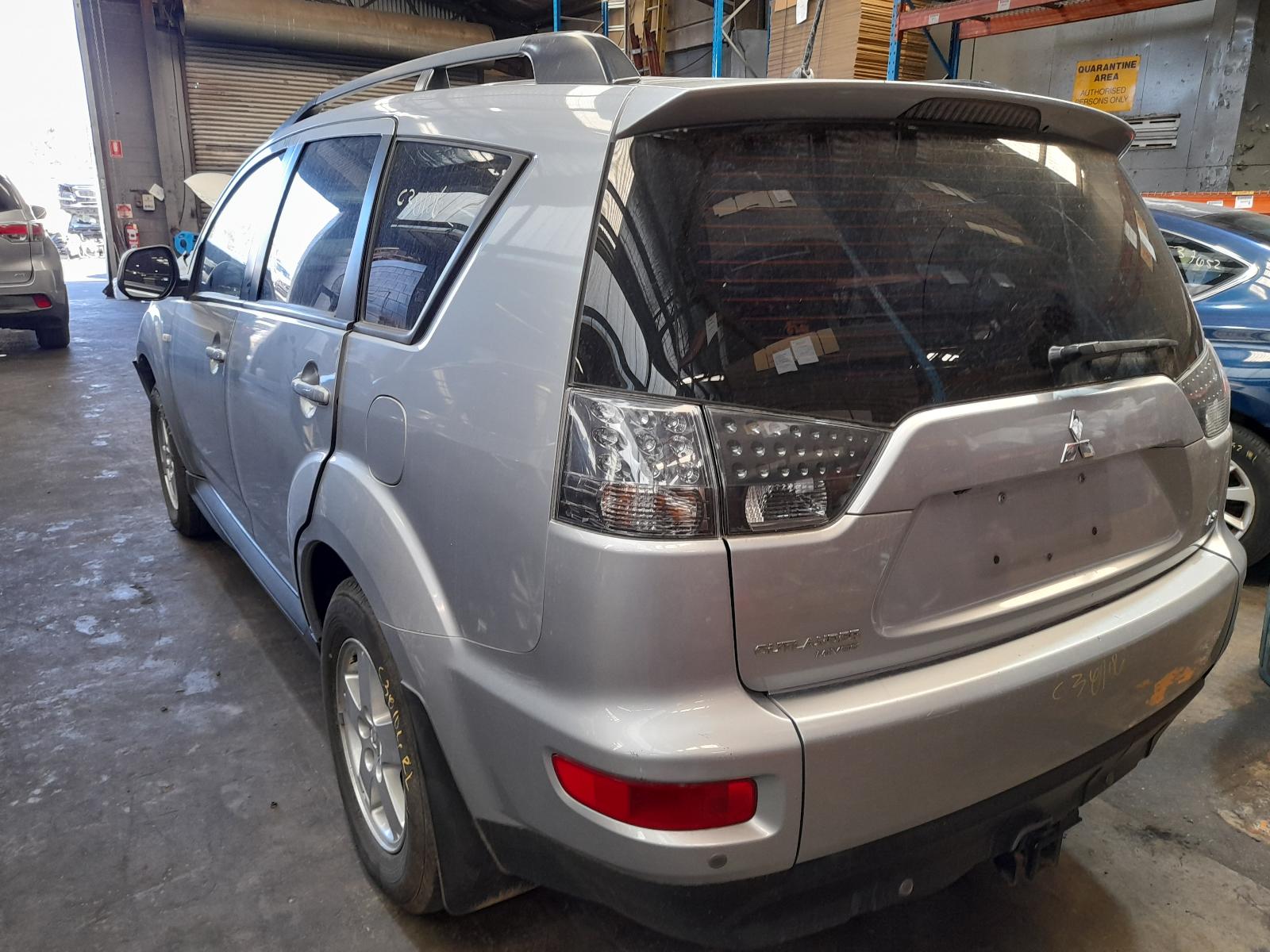 View Auto part Rear Garnish Mitsubishi Outlander 2011
