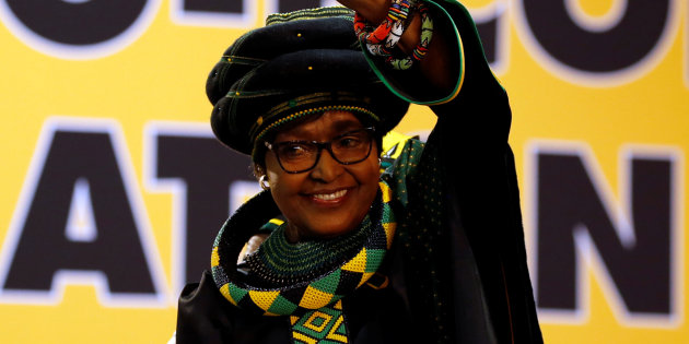 Winnie Madikizela Mandela, ex-wife of former South African president Nelson Mandela, gestures to supporters at the 54th National Conference of the ruling African National Congress (ANC) at the Nasrec Expo Centre in Johannesburg