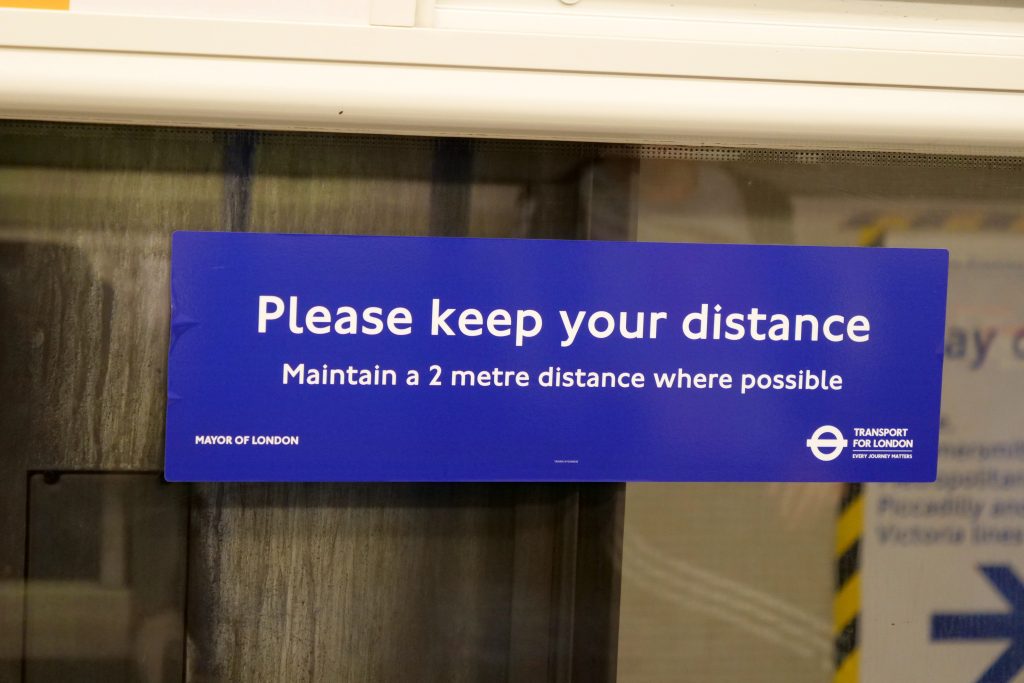 Retail trends for 2021 - ethical values and messaging. From the London Tube maintain distance image