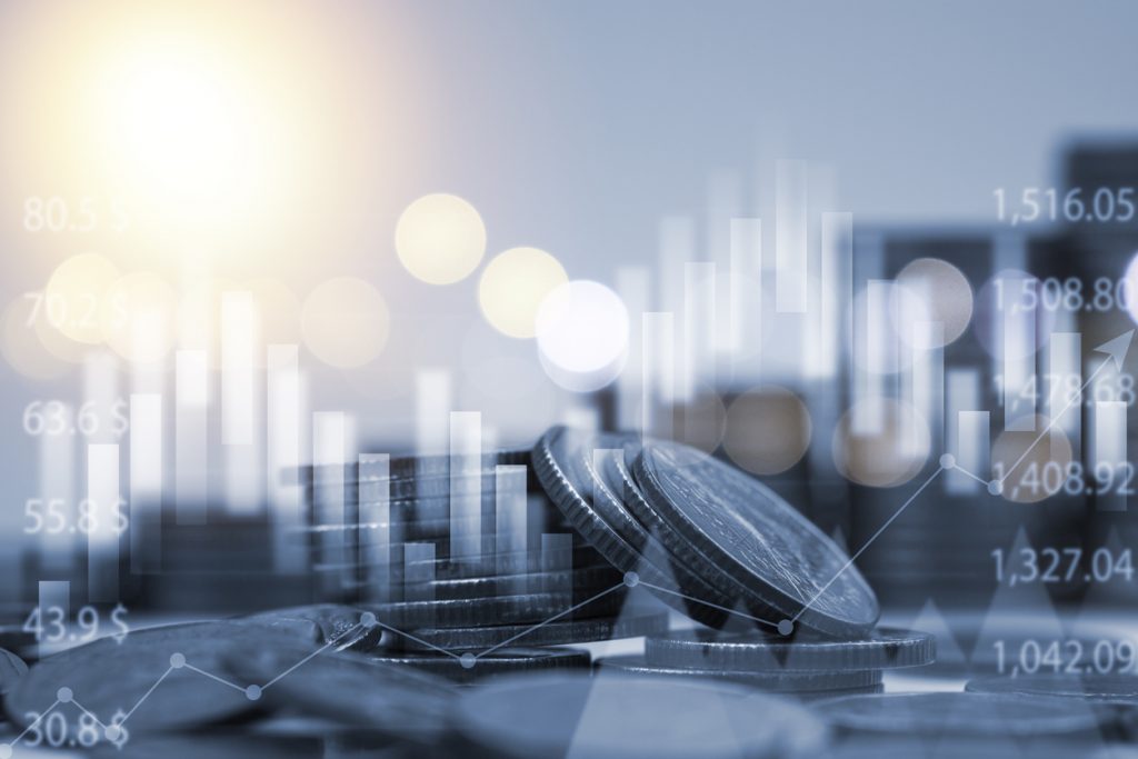 Business benefits of a four day work week illustrated by money going up.