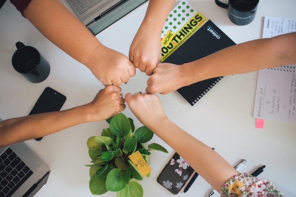 Collaborate with partners on your first party data, image of a fist bump