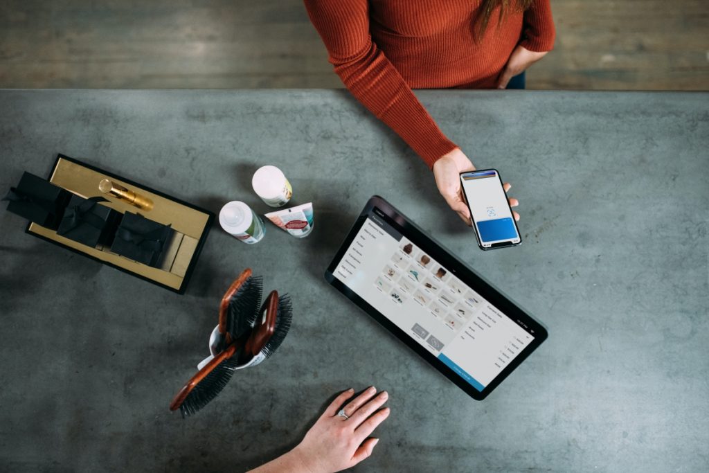 what is customer lifetime value - image of a customer paying for a product.