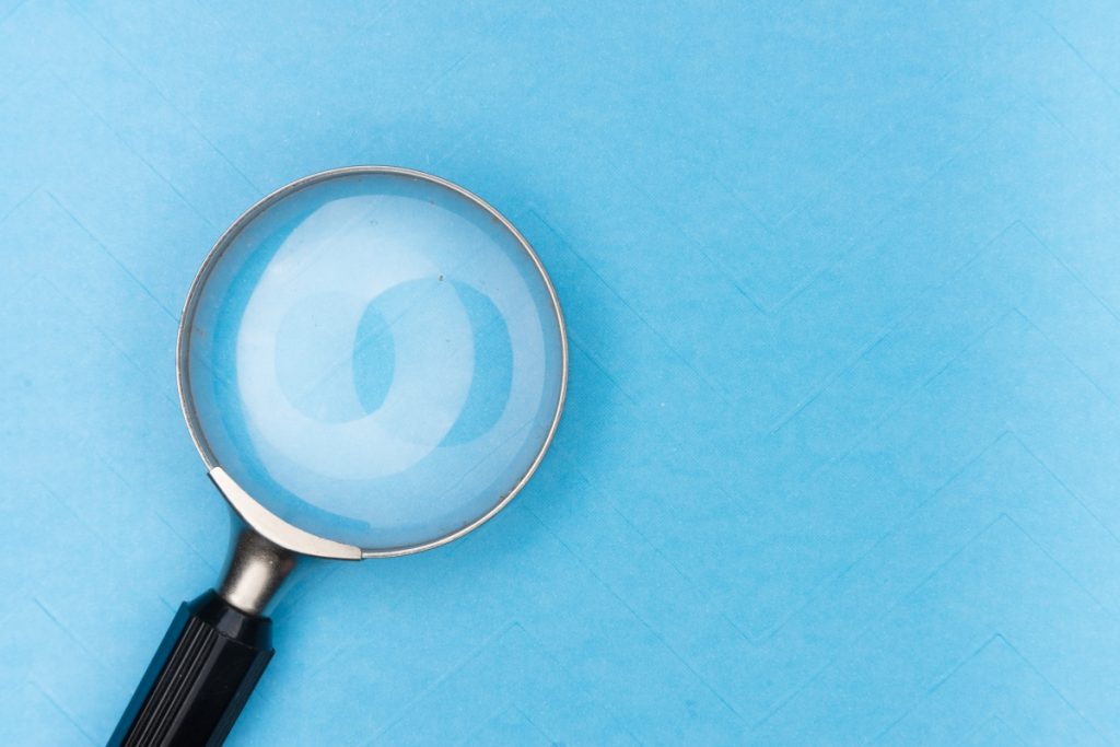 Image showing a magnifying glass to symbolize search engines.