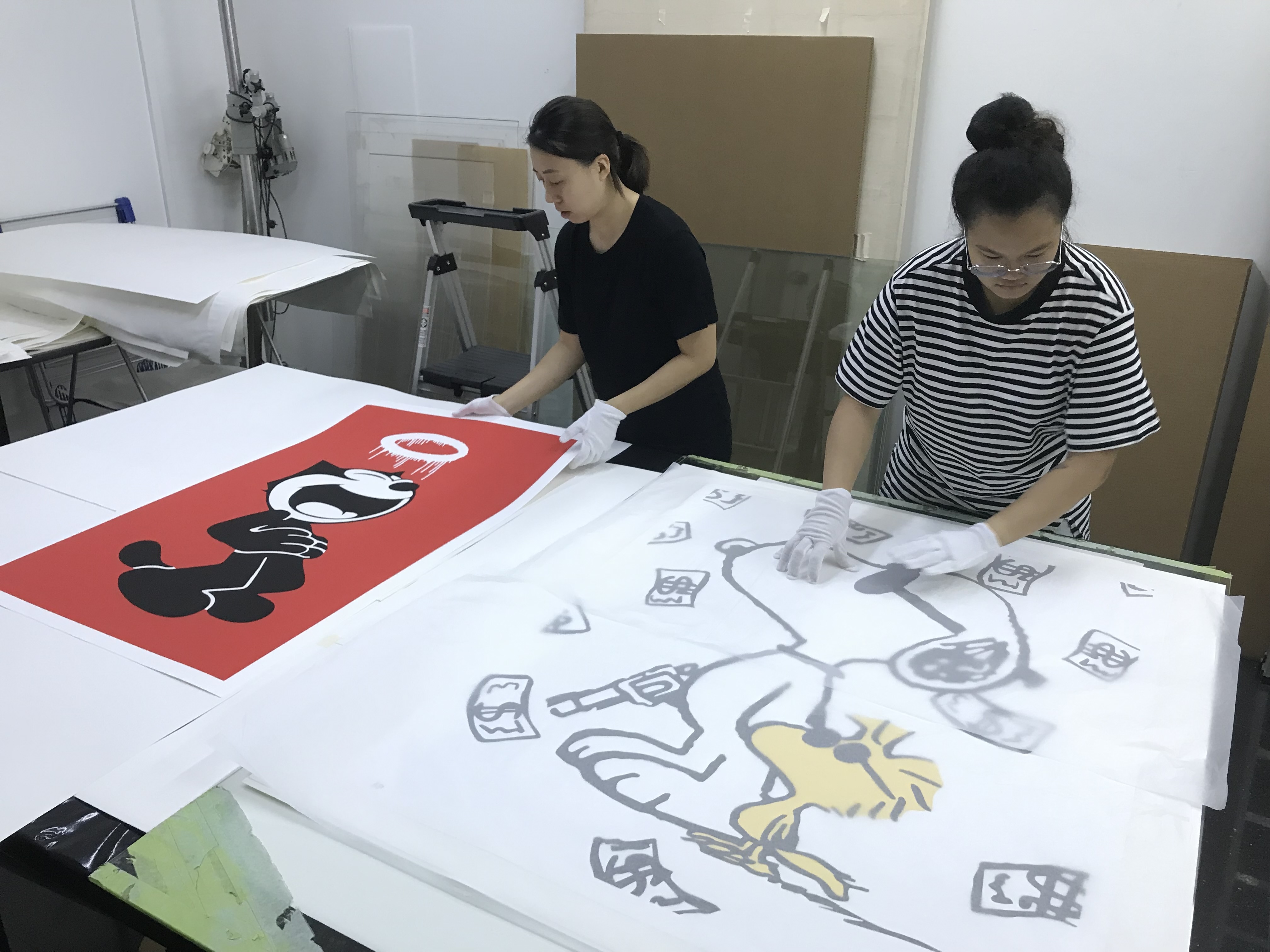 The PIA Studio Team - Handling Artwork.jpg