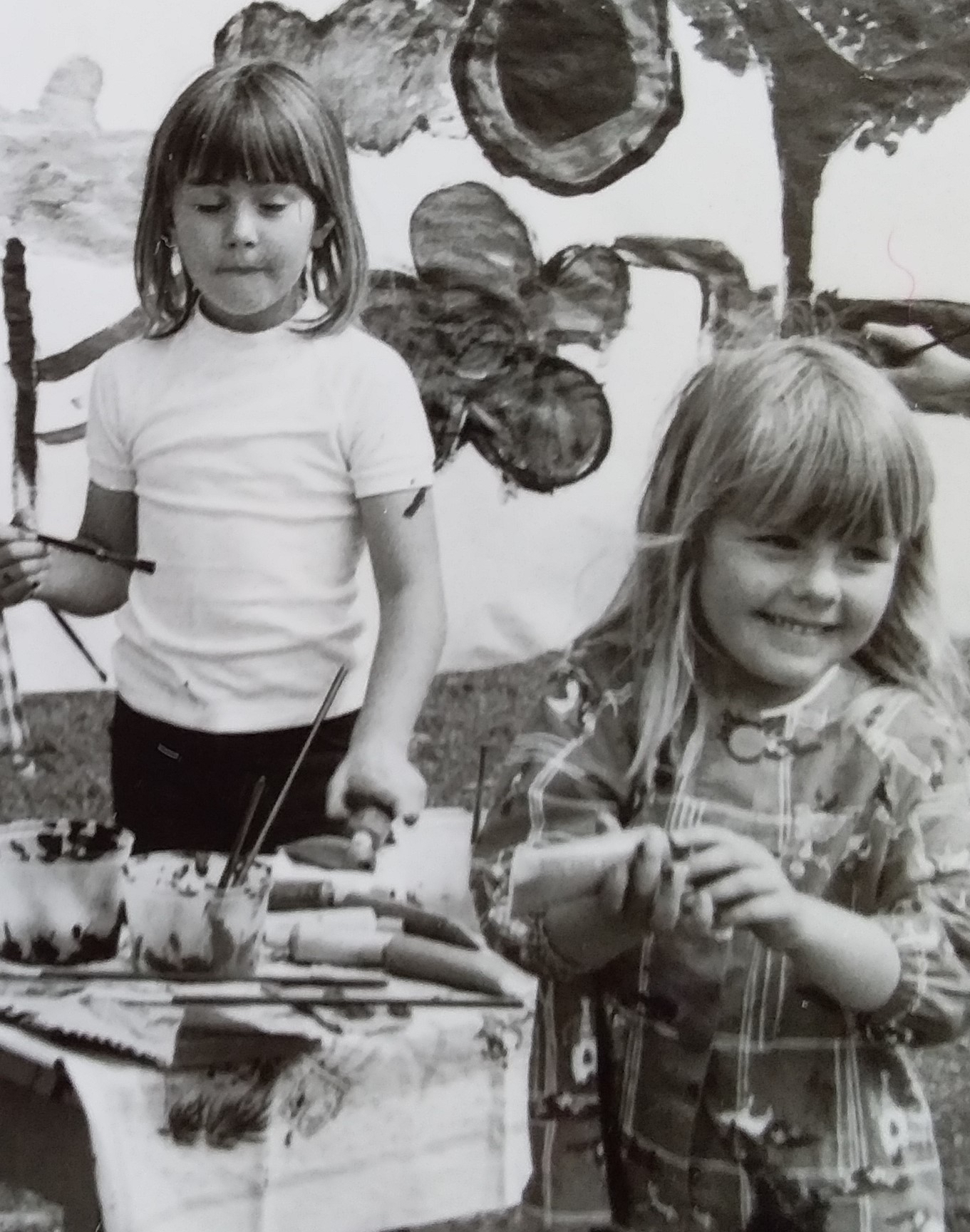 Lara Painting as child with sister Karly.jpg