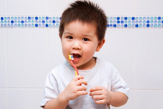 Toddler brushing teeth