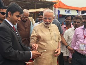 Bhavish Aggrawal helping PM Modi to book Ola e-rick