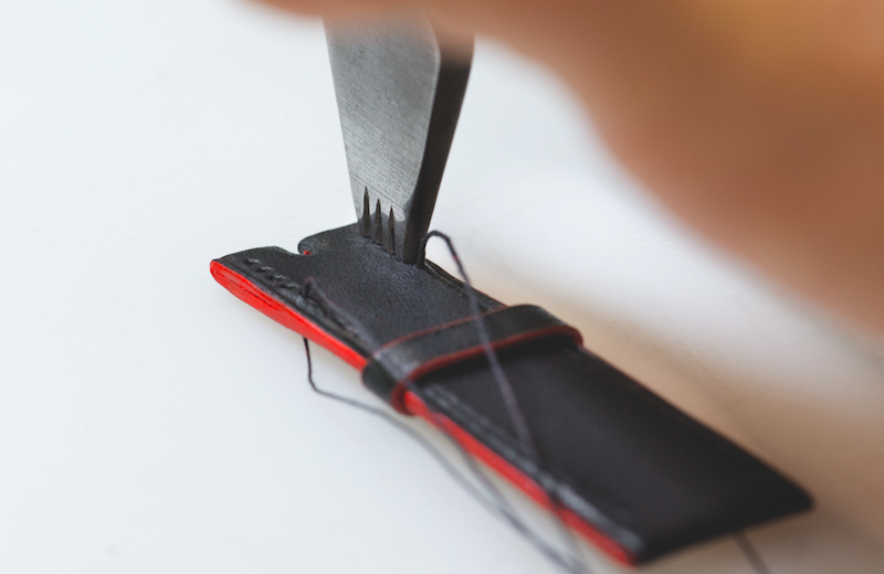 Stamping the strap of the Hermès Cape Cod Shadow. Image © Pierre-William Henry