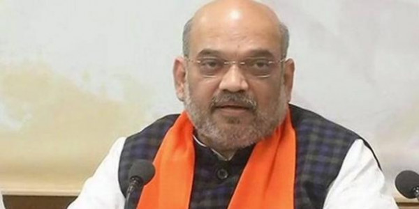 मोदी के 4 साल पर शाह बोले- वो मोदी को हटाना चाहते हैं, हम गरीबी