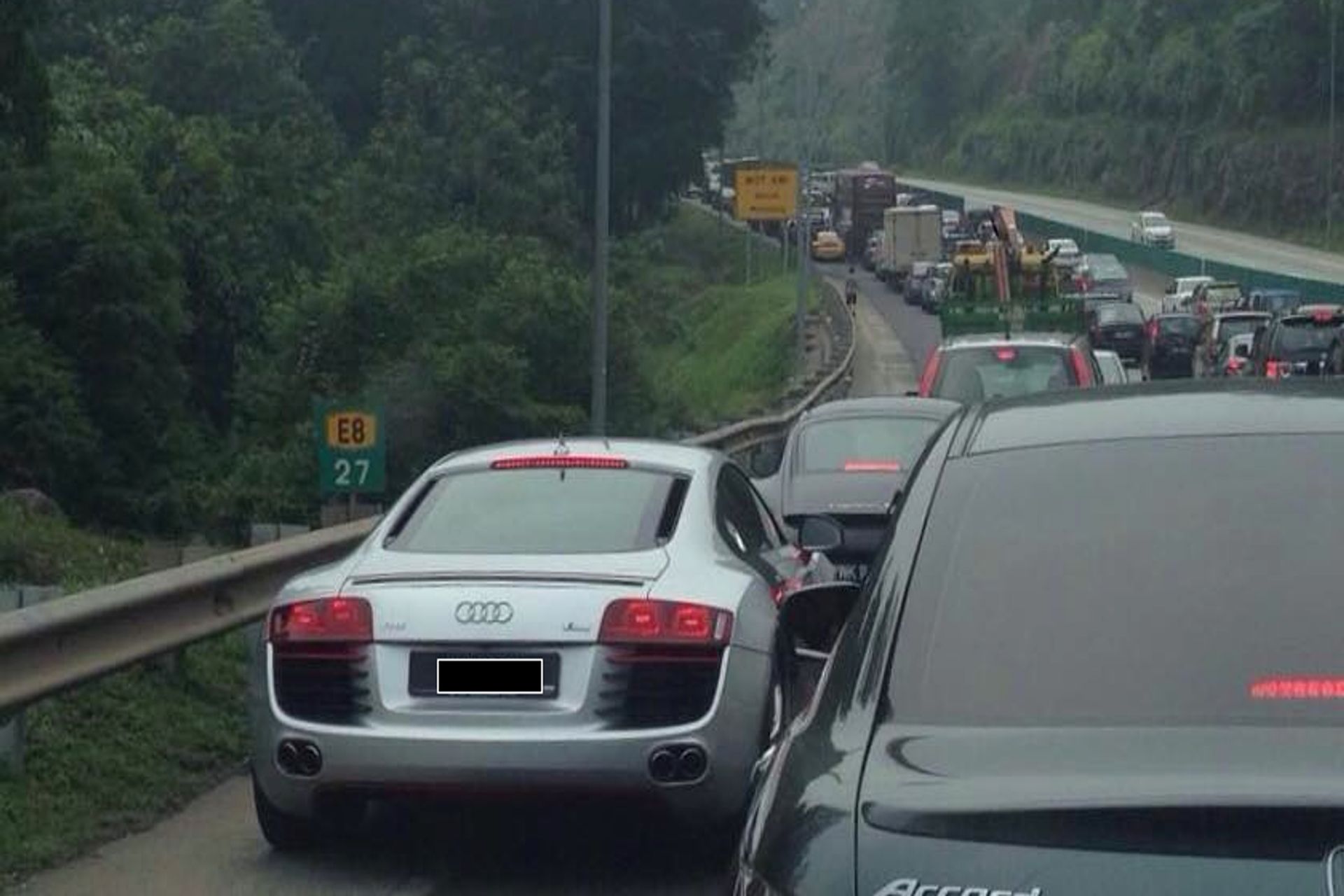 Editors%2 Fimages%2 F1639128893930 Malaysian Car On Road Shoulder