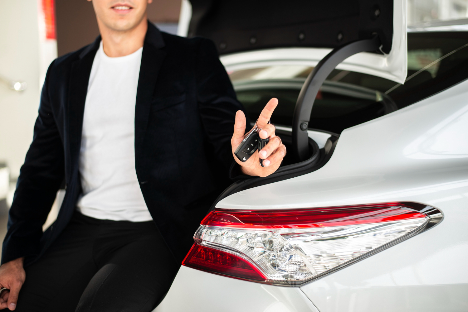 Editors%2 Fimages%2 F1647489730820 Elegant Young Man Holding Car Keys+%281%29