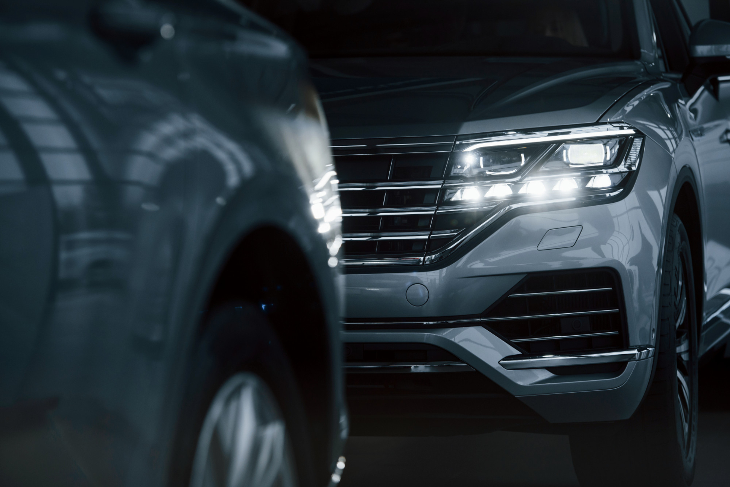 Editors%2 Fimages%2 F1654574330402 Powerful Headlights Particle View Modern Luxury Cars Parked Indoors Daytime