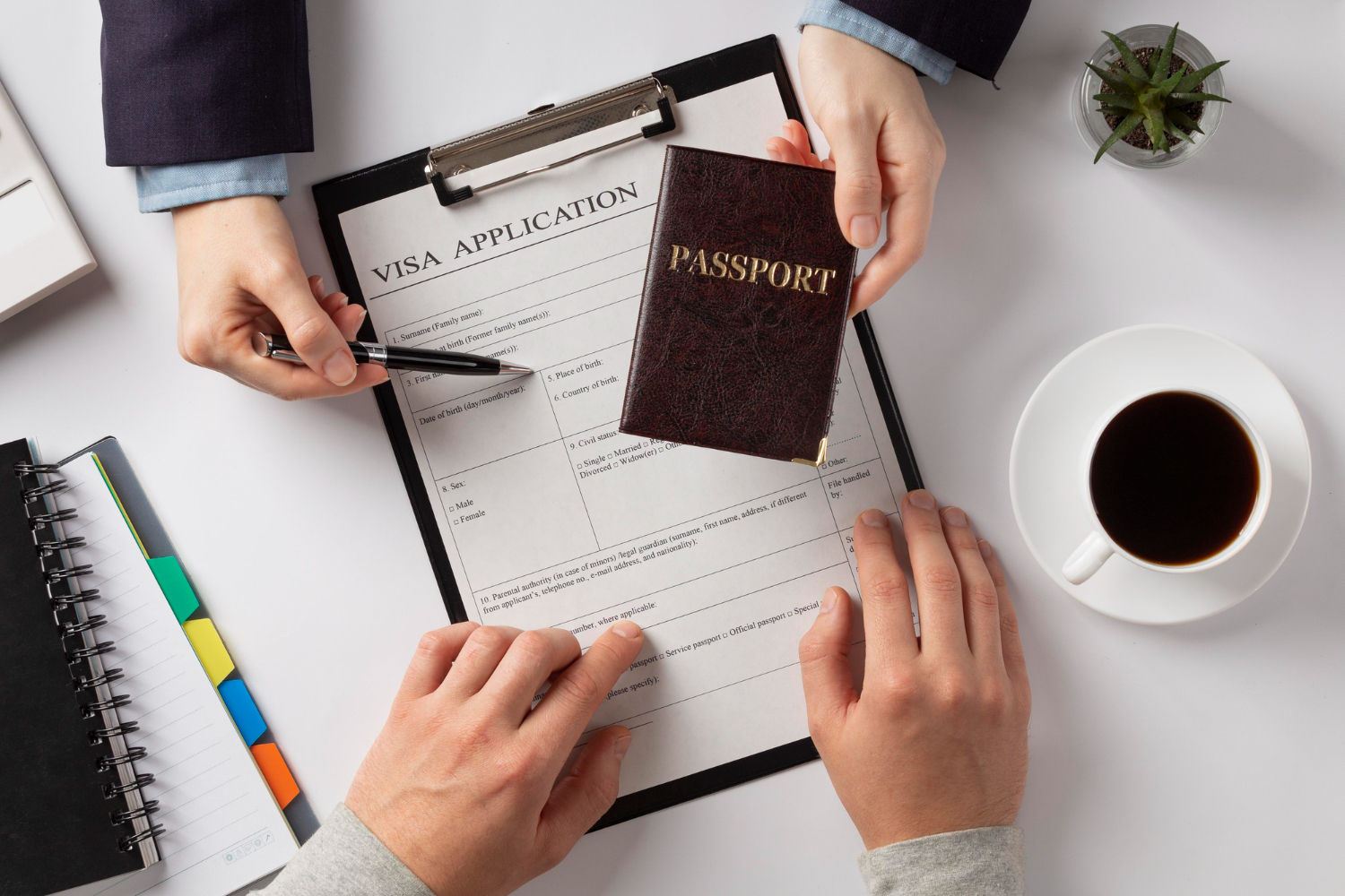 Editors%2 Fimages%2 F1669370873653 Flat Lay Visa Application Assortment