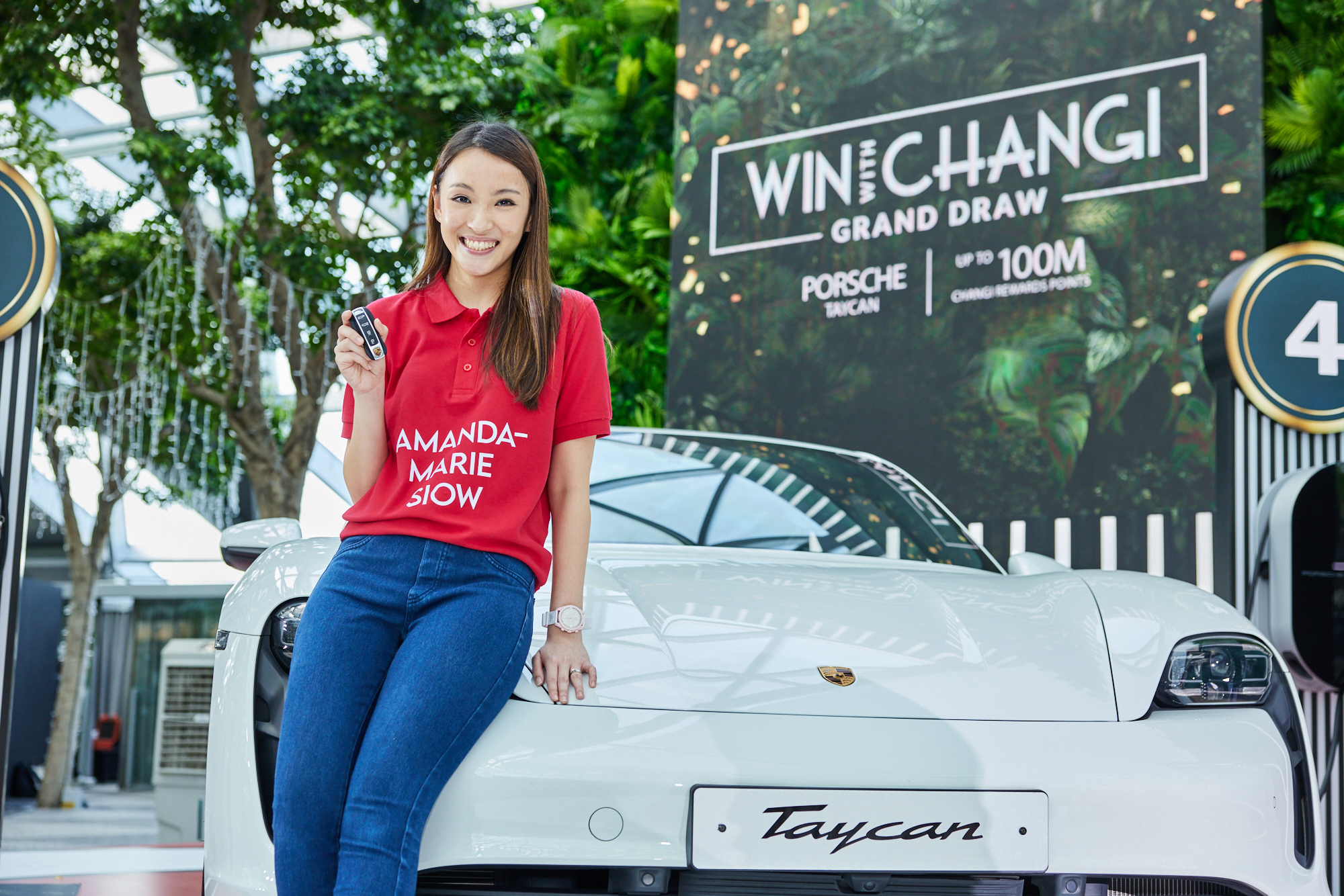 Editors%2 Fimages%2 F1676875703612 Taycan+Changi Featured