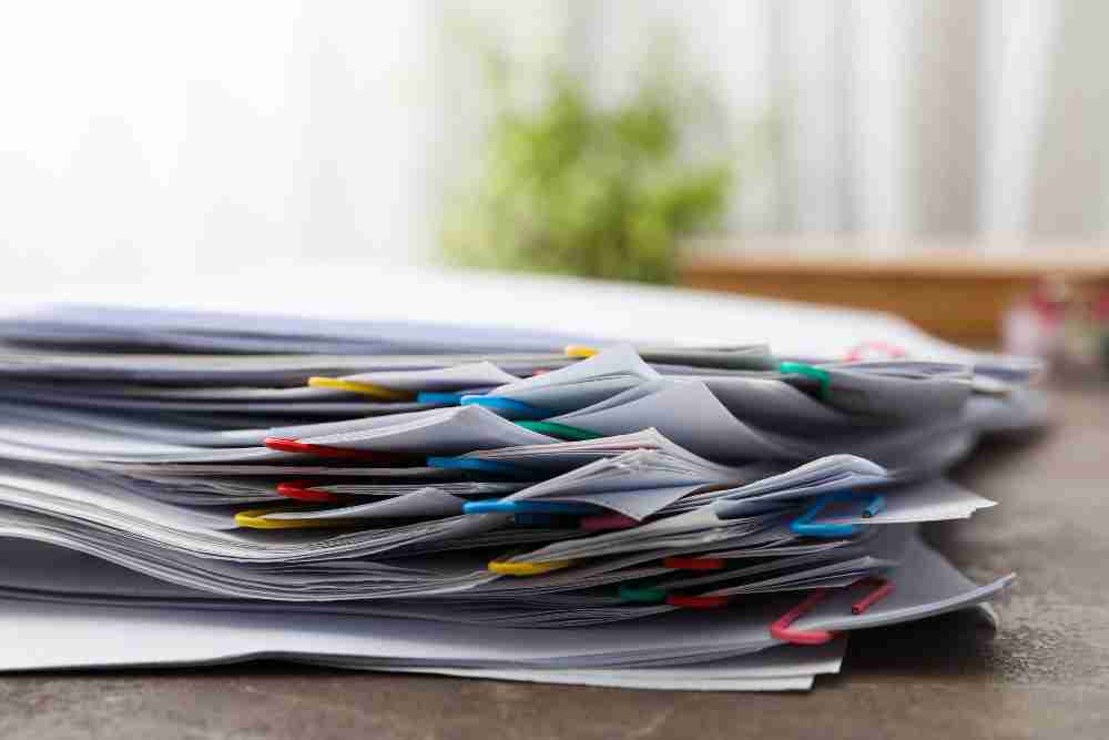 Editors%2 Fimages%2 F1695894317532 Concept Different Office Accessories Paper With Clip