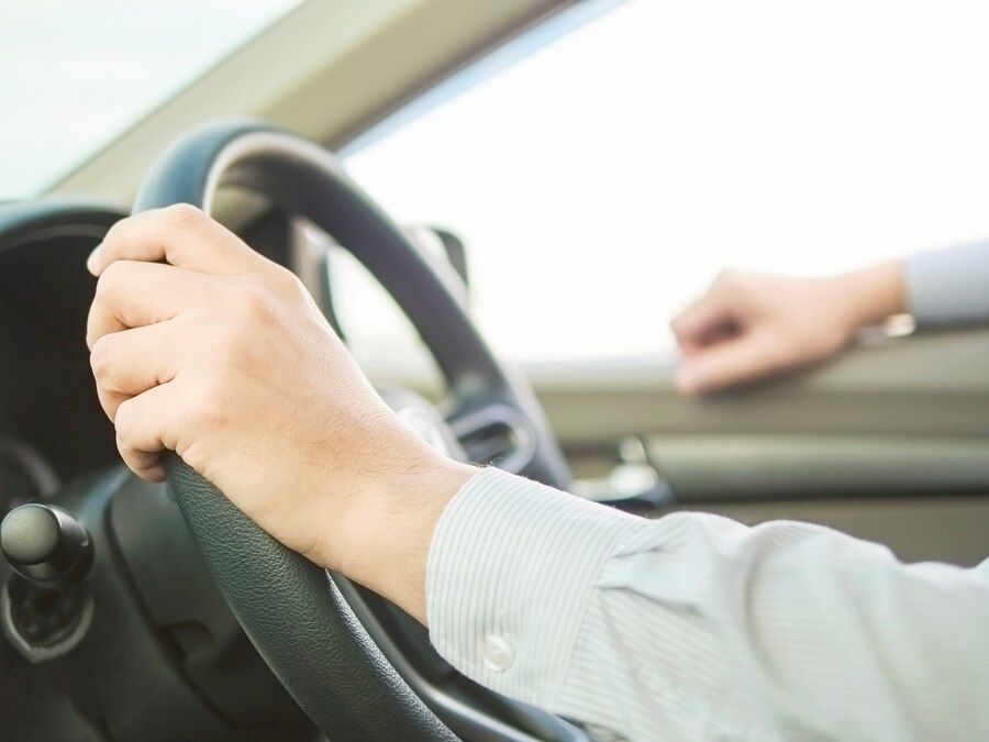 Editors%2 Fimages%2 F1715659895953 Close Up Man Driving Car Using One Hand Dangerous Behavior 1150 6179