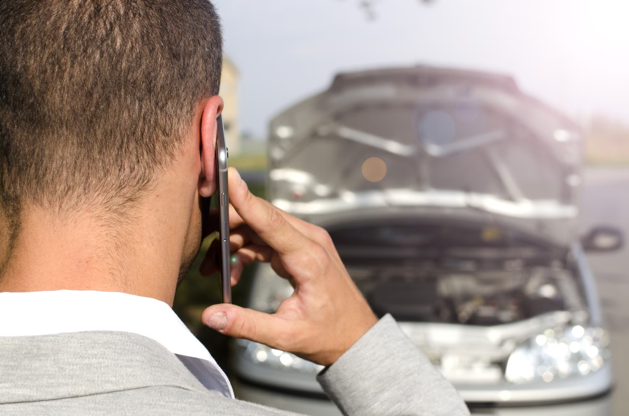 Editors%2 Fimages%2 F1717128847274 Man Standing By Broken Vehicle Calling Tow Service 342744 703
