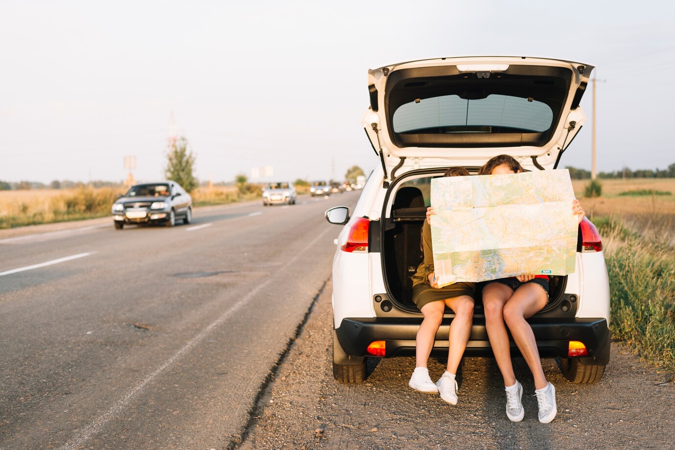 Editors%2 Fimages%2 F1741683952554 Women Sitting Car With Map 23 2147932077