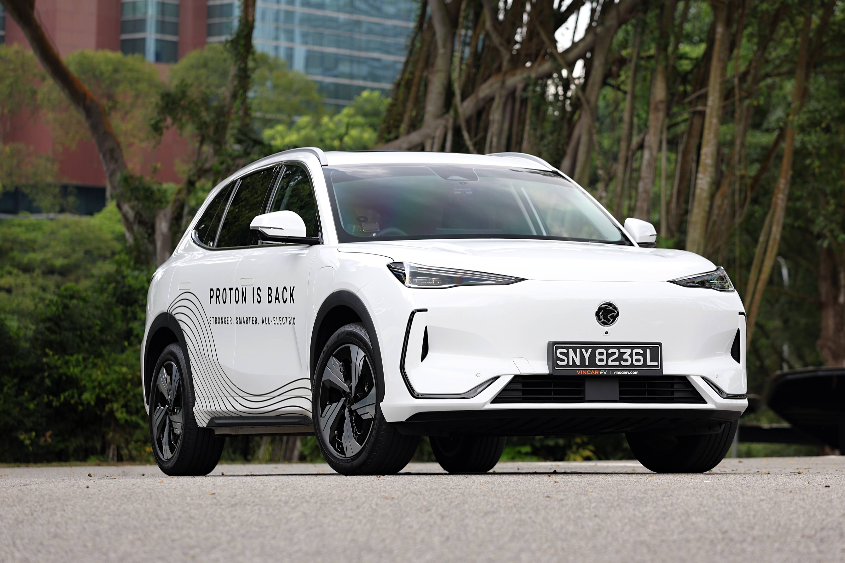 Editors%2 Fimages%2 F1774509677029 Proton+Singapore+Accelerates+To+100+ +Pic1