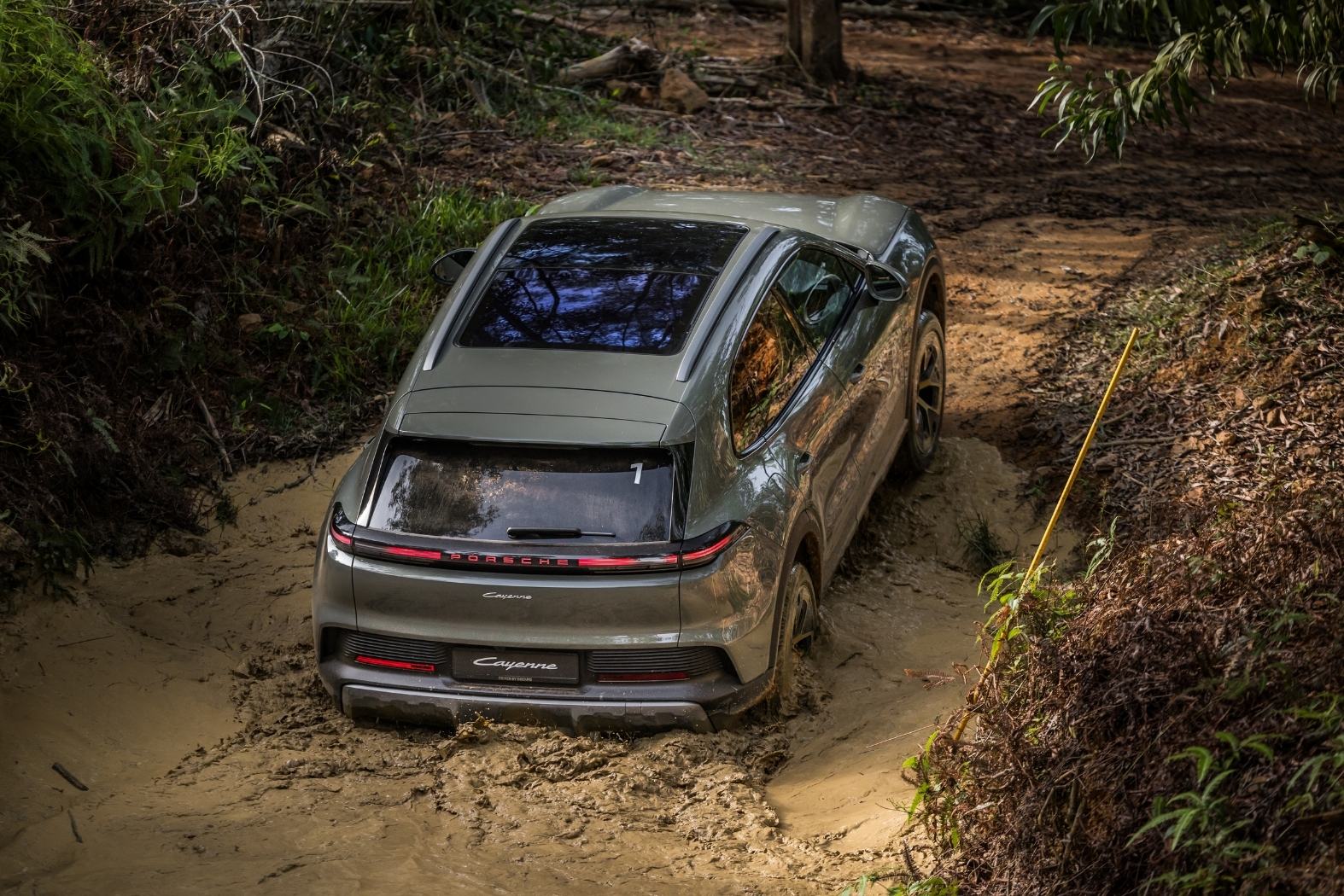 The Porsche Cayenne Electric on a dirt