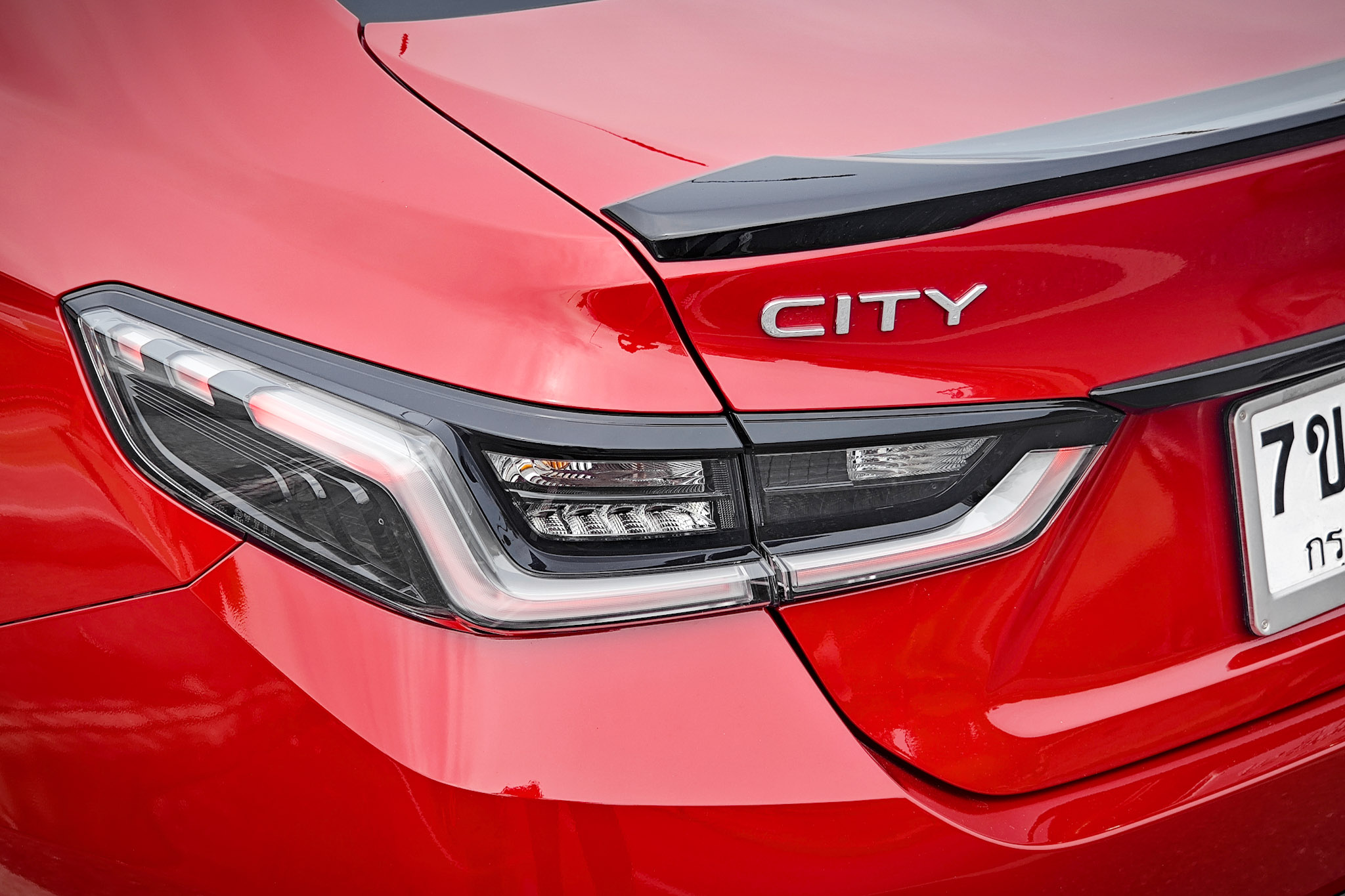 Clear smoked LED tail-light clusters on Honda City RS