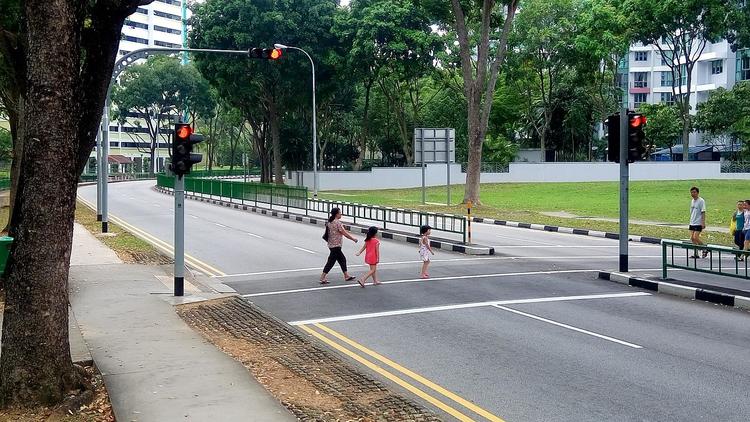 people crossing the road singapore