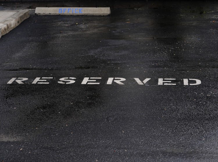 Rain Soaked Reserved Parking Spot