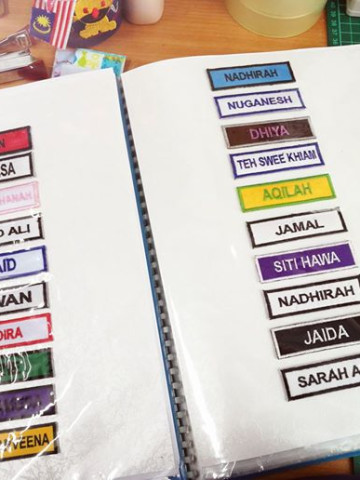 Photo 1 of TANDA NAMA SEKOLAH TP-499002 TANDA NAMA SEKOLAH warna kain & benang boleh dipilih.  Tiada minimum order dan kami juga terima tempahan pukal.