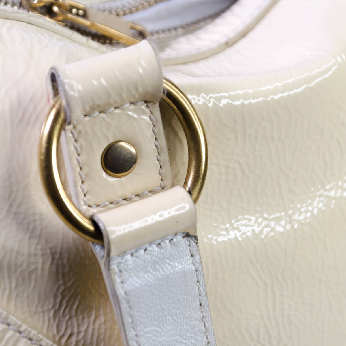 cream patent bag