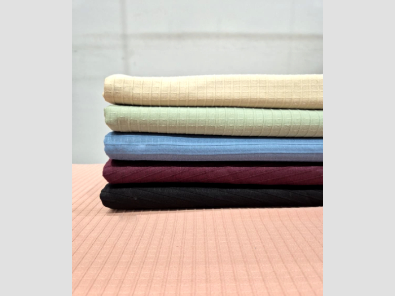 Plain fabric for garment manufacturing and apparel use